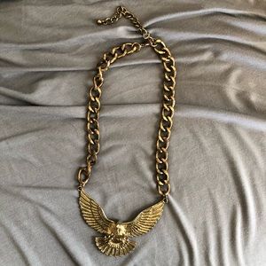Gold hawk necklace
